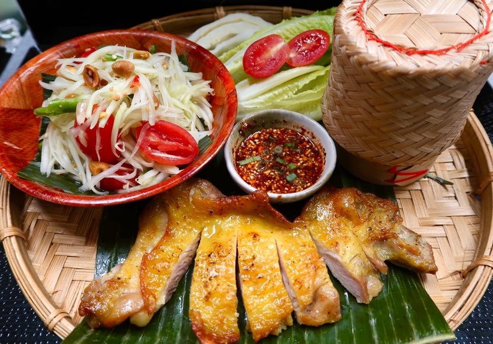 26. Grilled Chicken with Som Tum Sticky Rice