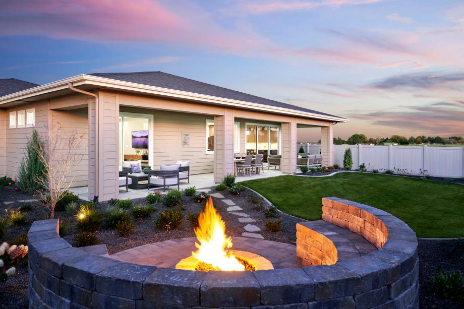 Expanded backyard covered patio with firepit