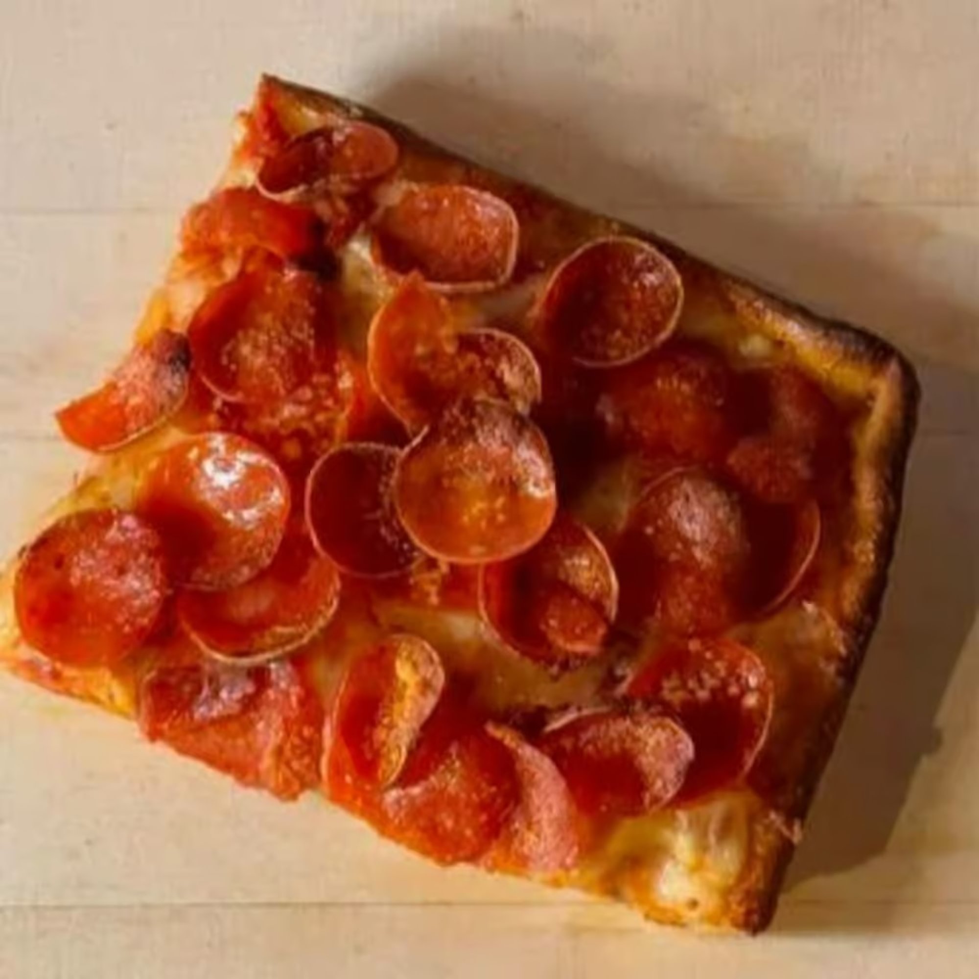 Sicilian Pepperoni Cup Pizza Slice