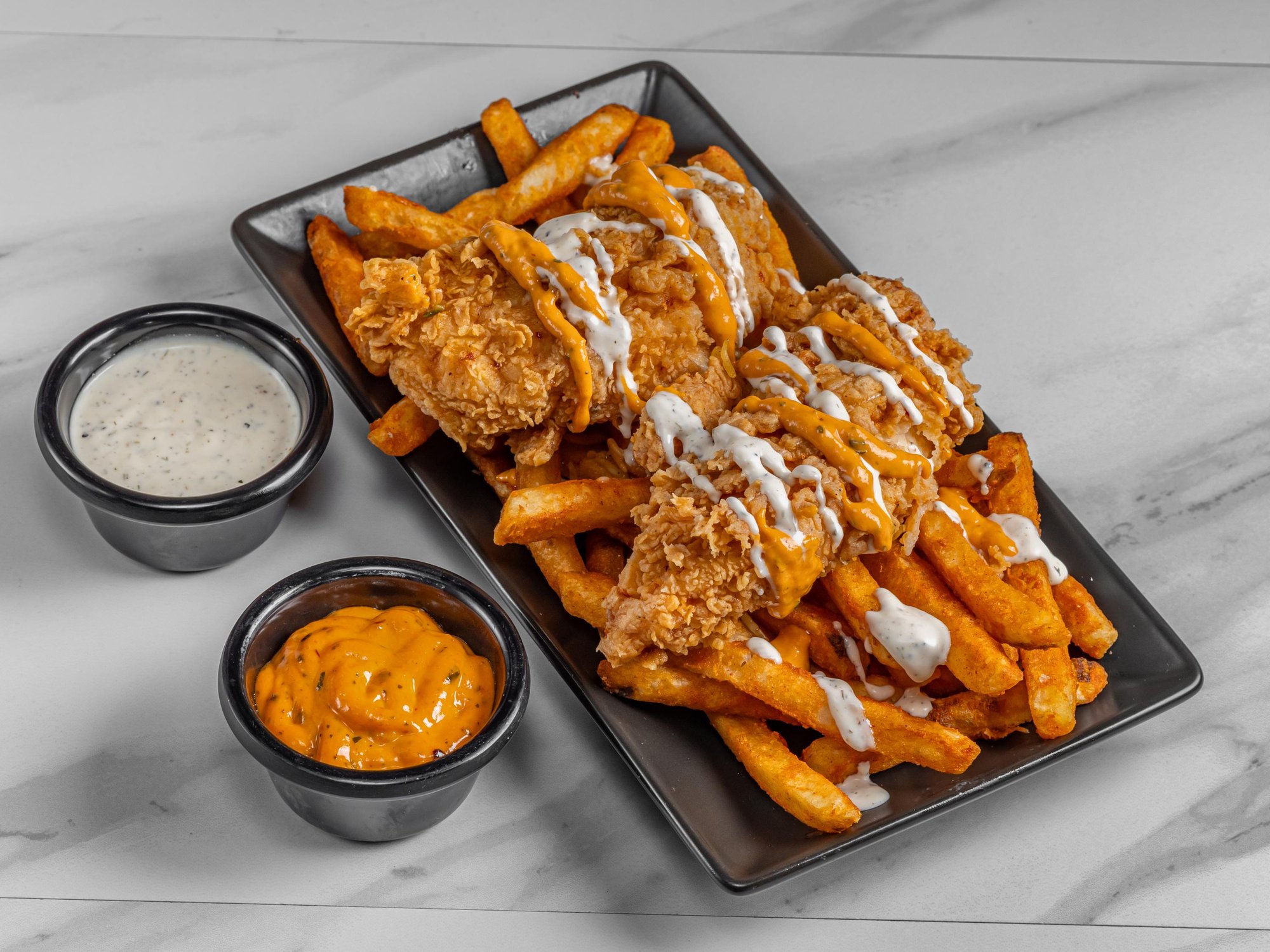 Fried tender over fries