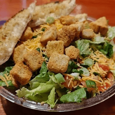 Tossed Green or Caesar Salad