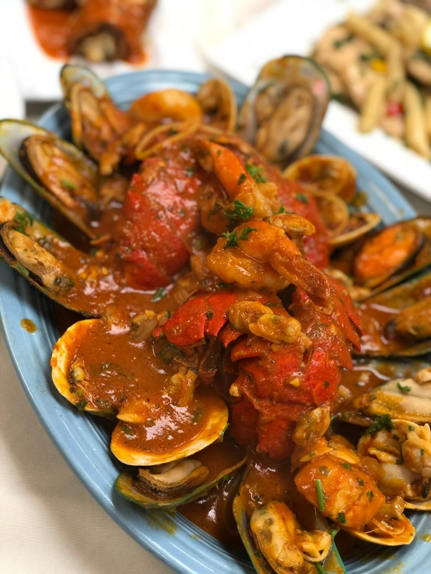Seafood Colosseum Over Linguine