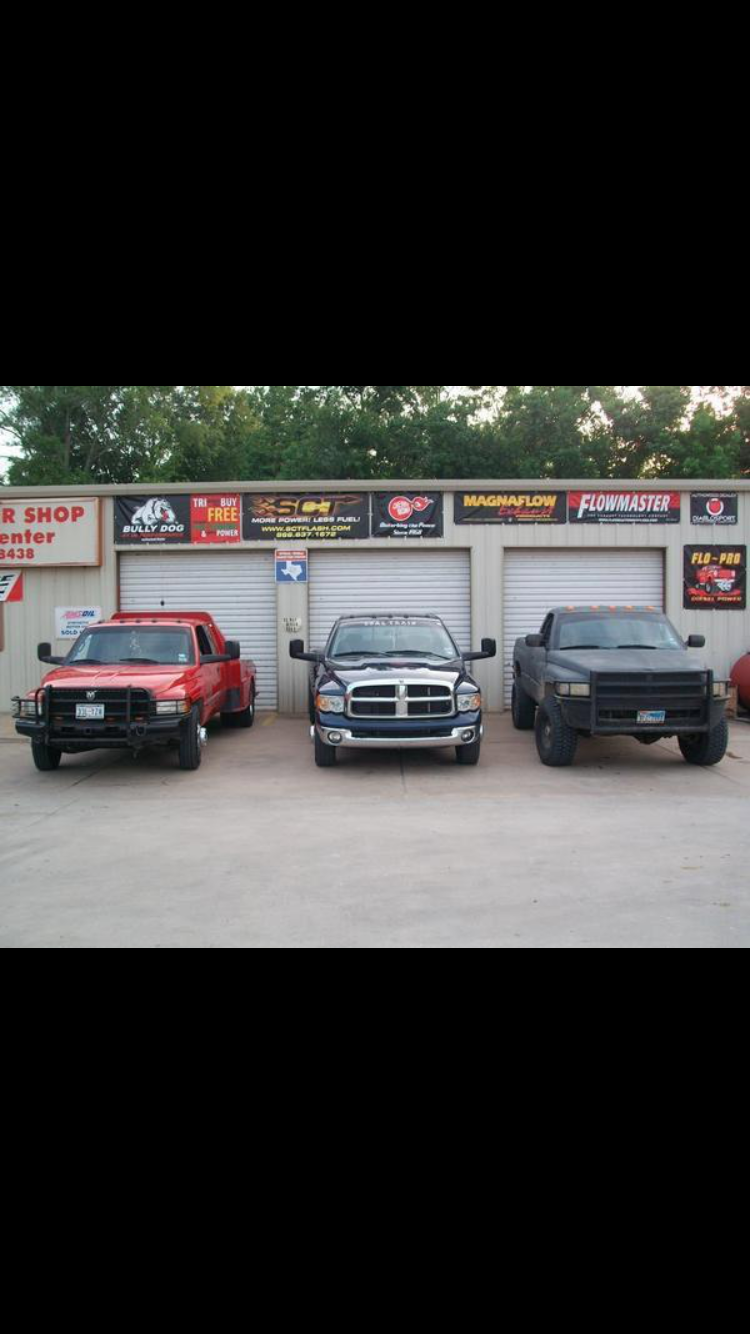 Trinity Muffler Shop &amp; Lube Center Logo