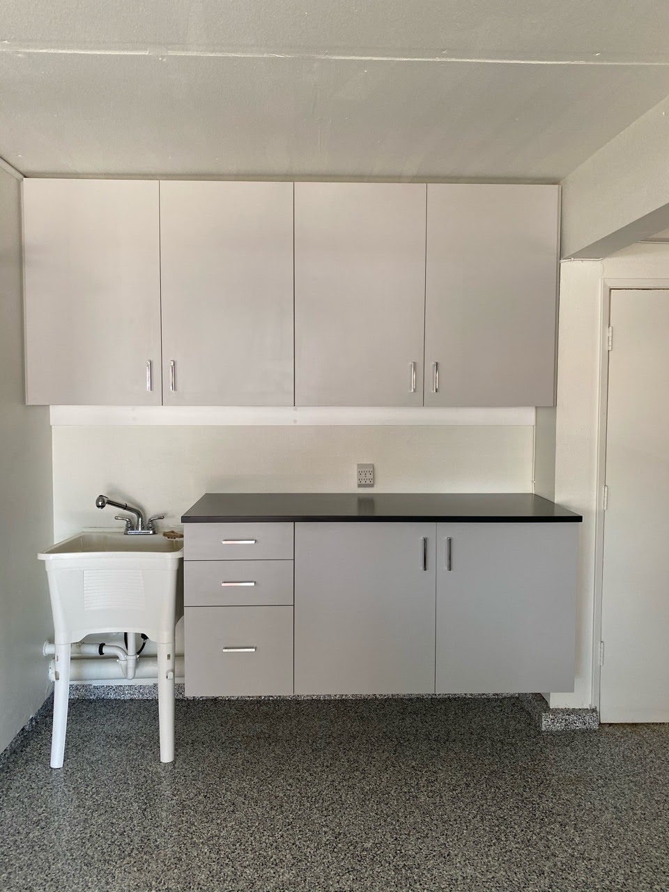 Ebony Star Countertop w/ Grey Cabinets