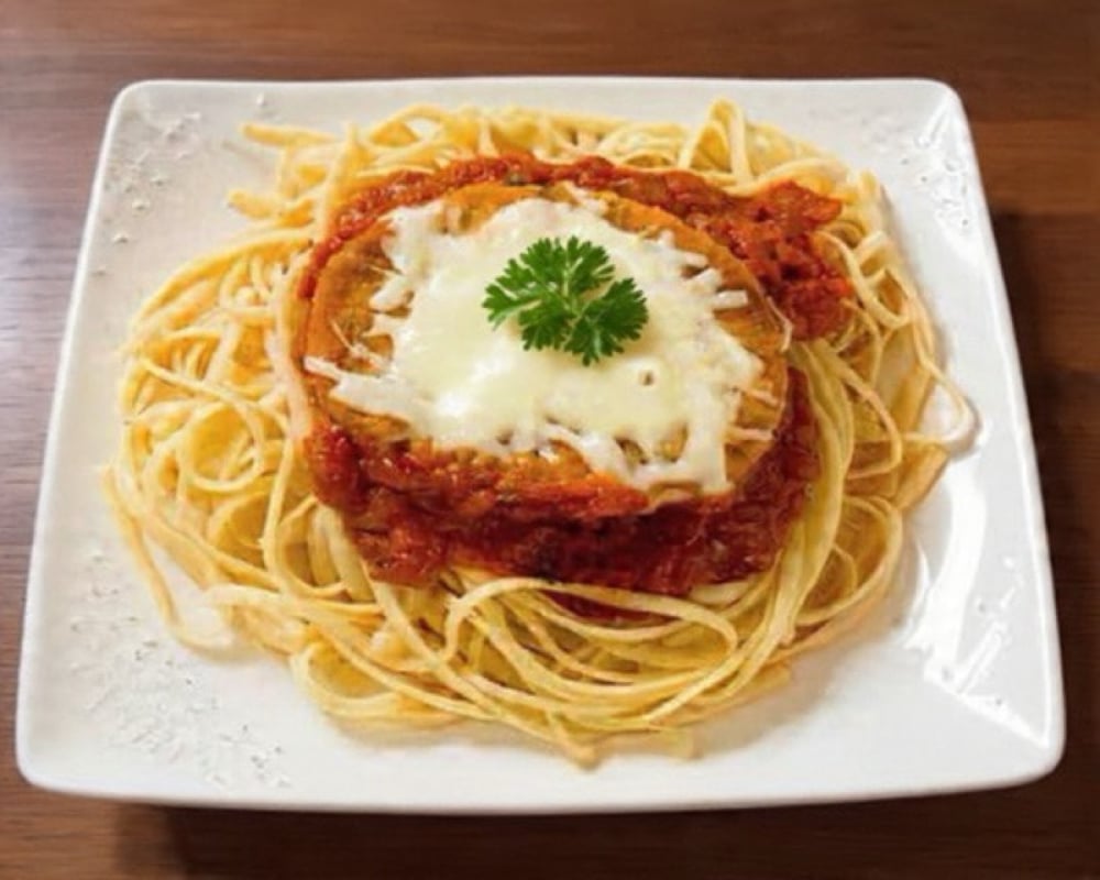 Chicken Parmesan over Spaghetti