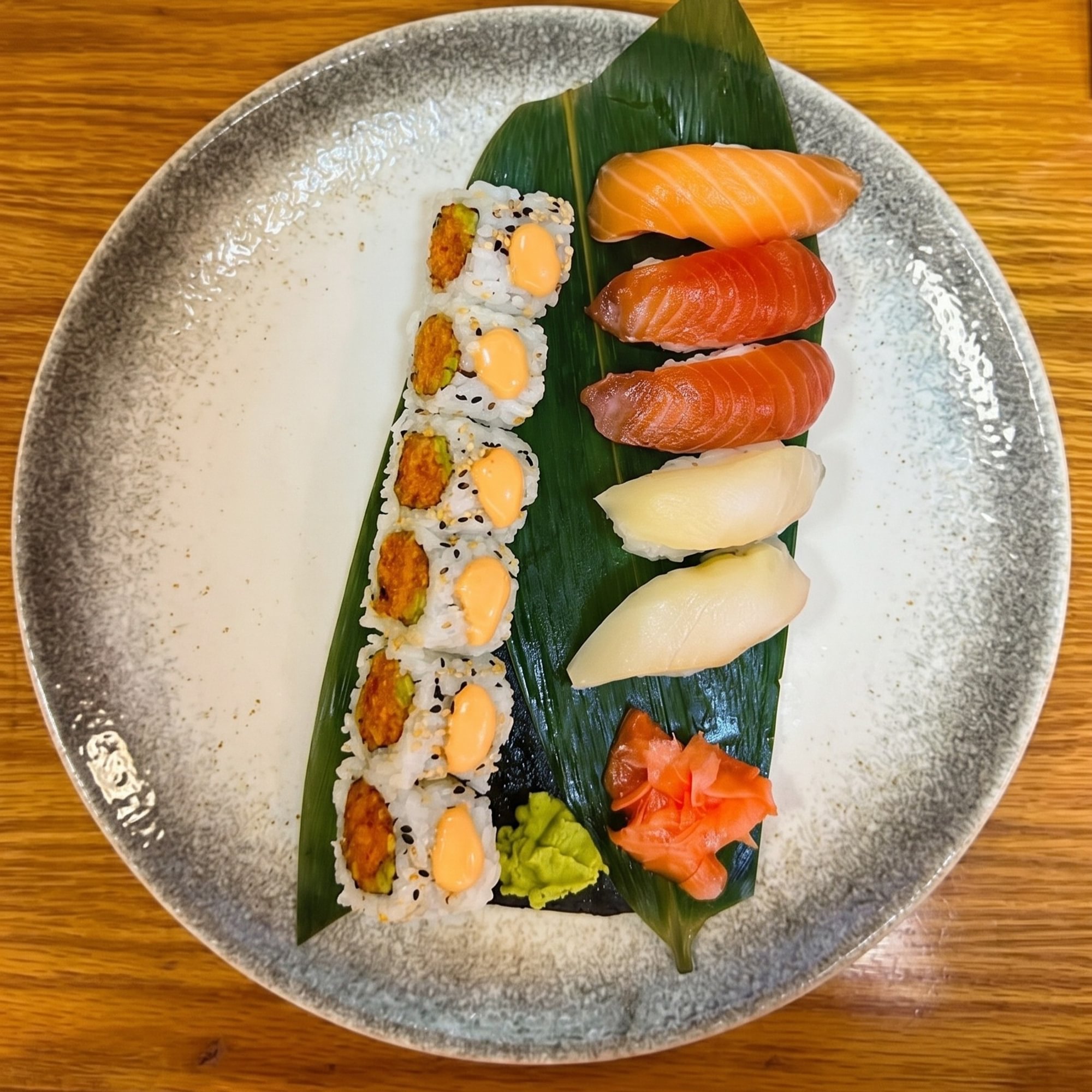 Nigiri Sushi and 1 Spicy Salmon or Spicy Tuna Roll