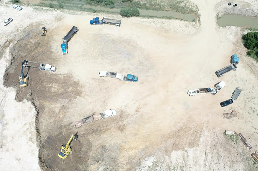 WM Trucking &amp; Excavating Inc. Logo