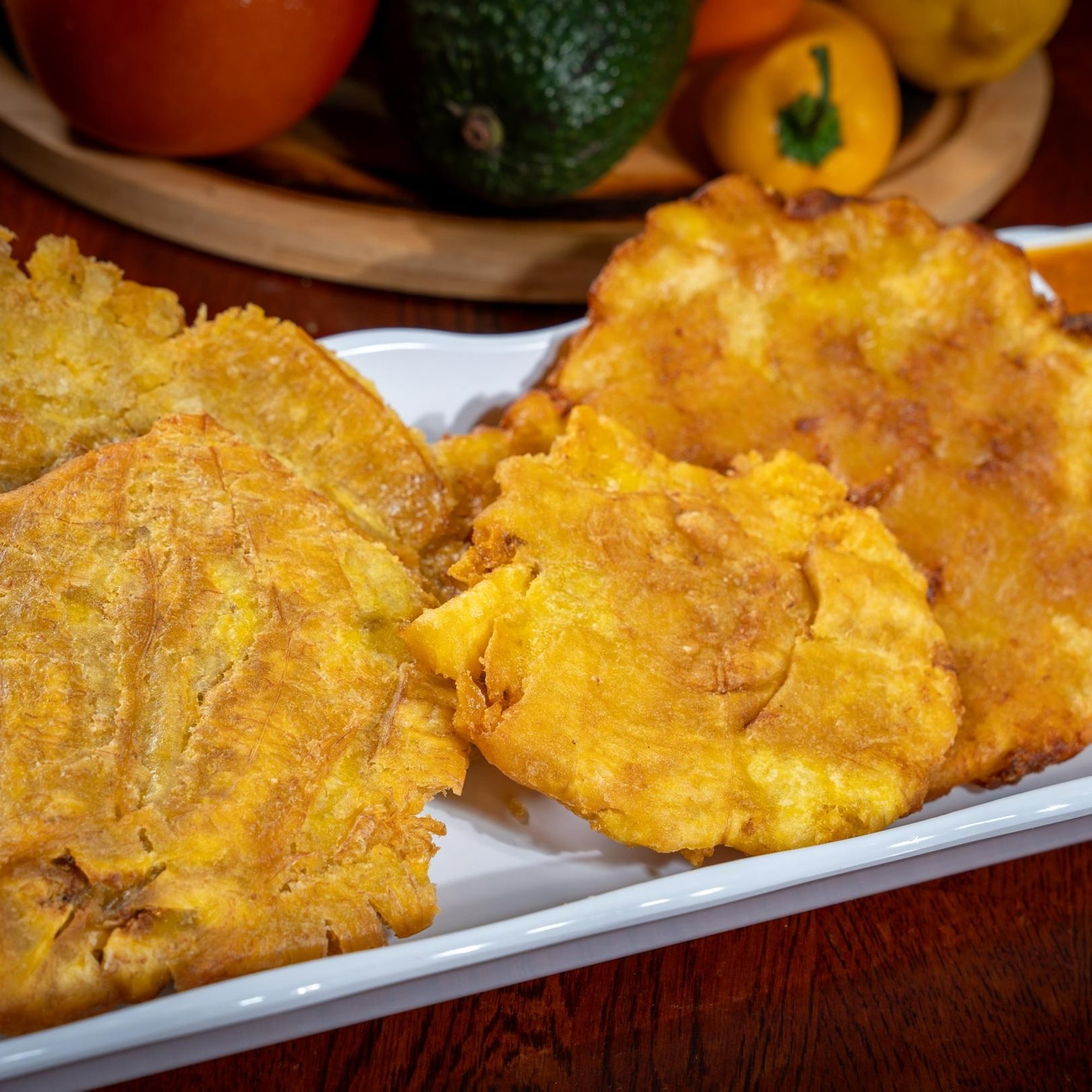 Fried Green Plantains with Guacamole and Hogao (Tostones con Guacamole y Hogao)