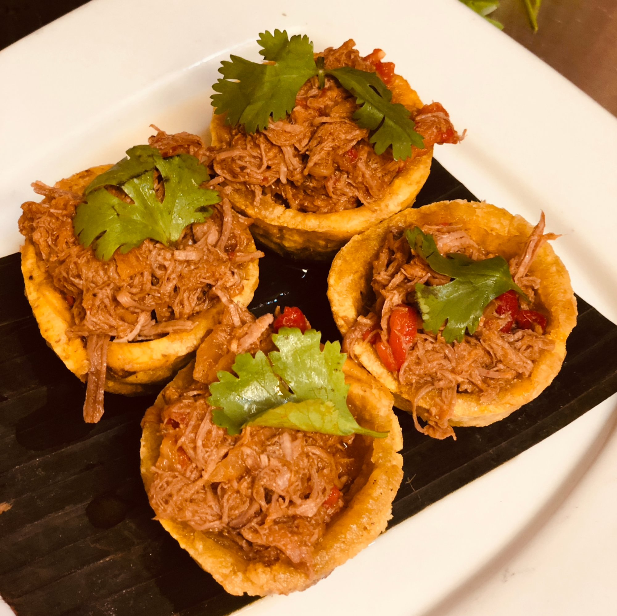 Tostones Rellenos - Plantain cups with meat