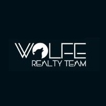 Wolfe Realty Team - Erica Gouldy Wolfe Logo