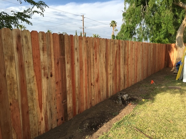 Dogeared Redwood Fence