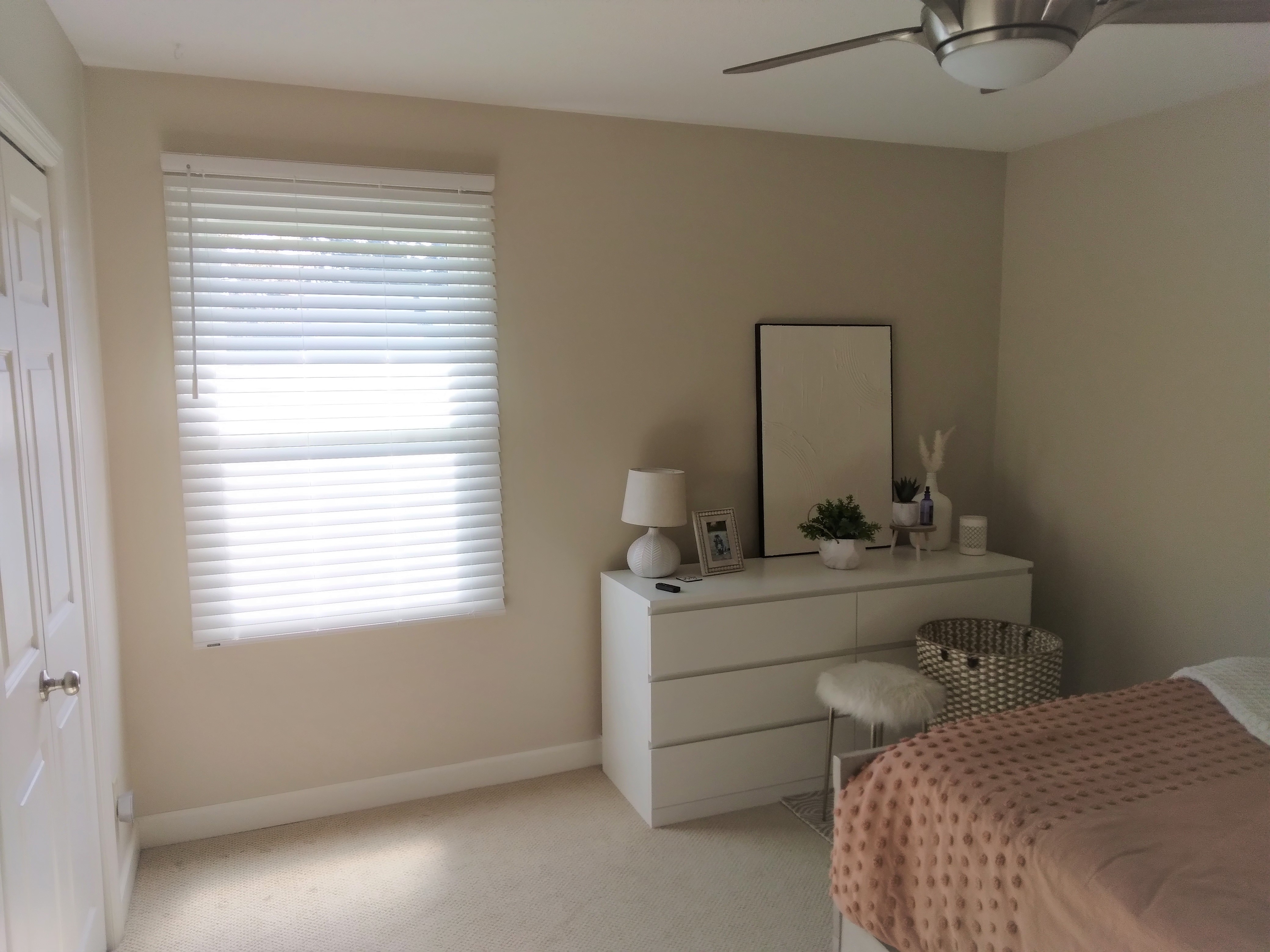 These white faux wood blinds look great in this Springfield Illinois bedroom.  BudgetBlinds  WindowCoverings  Blinds  SpringfieldIllinois