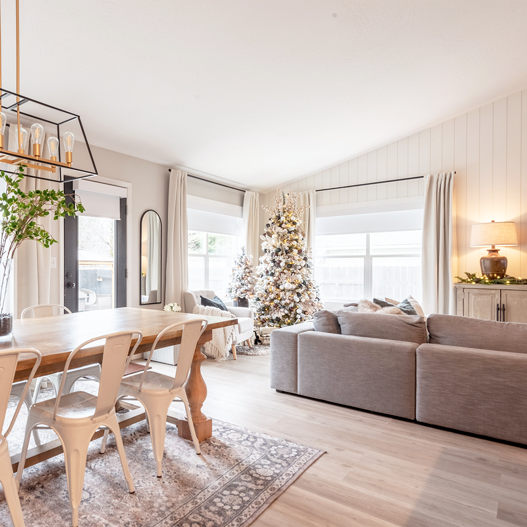 It's beginning to look a lot like Christmas in this festive home! Roller shades and drapery panels combine to give flair and style to this space while inviting in lots of natural light.