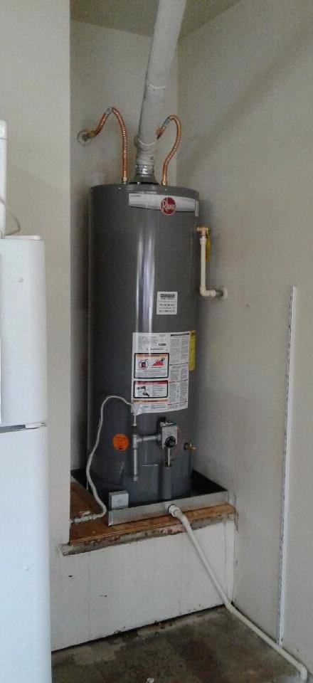 You may have heard of Elf on a Shelf but this Rheem is supreme- 40 Gallon Natural Gas Tall Professional Classic series PROG40-38N RH62 ground floor install.