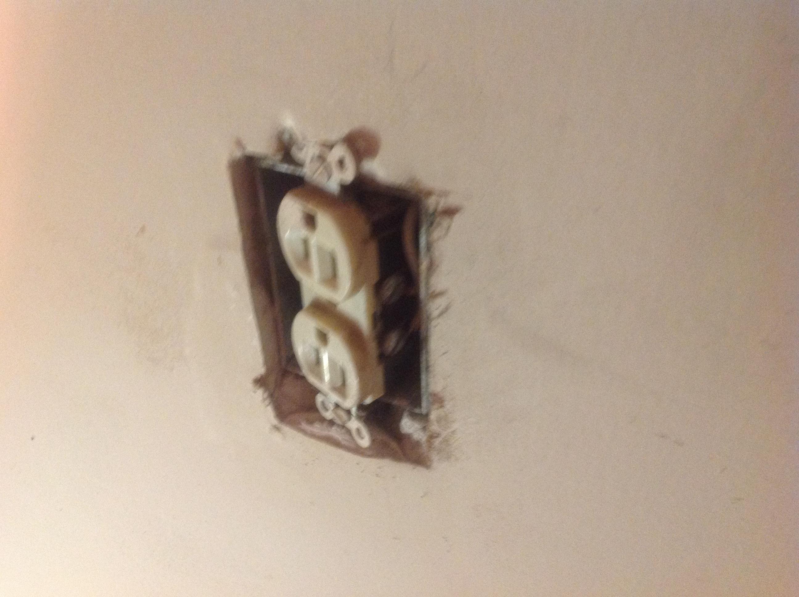 This receptical was missing its cover and is a safety hazard due to possible electrical shock hazard and should be addressed by a professional electrician. Found by Bumgardner Inspection Services in Miamisburg ohio