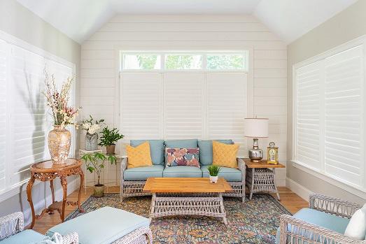 With our Shutters, you can transform a sunroom into a gorgeous second living space! See for yourself in the beautiful space featured in this image!