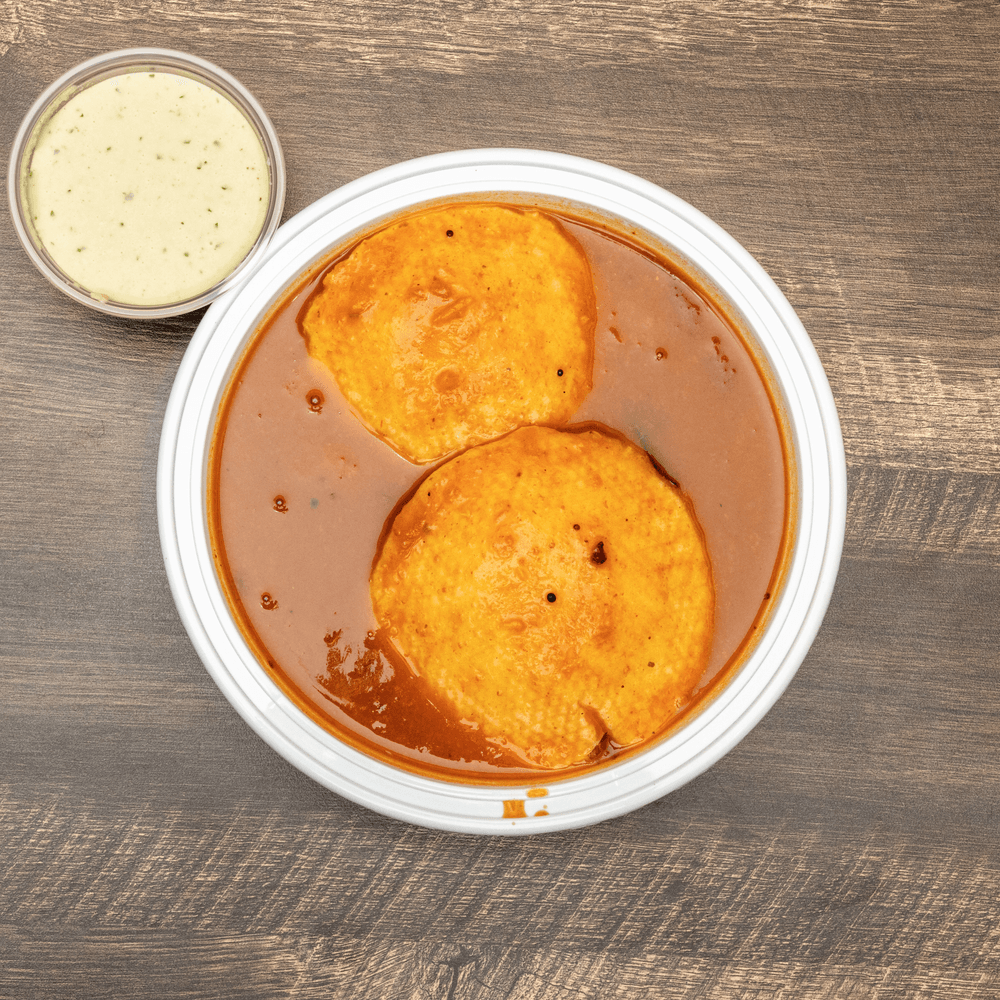 Idli in Sambar- 2Pc's (Comes with Chutney)