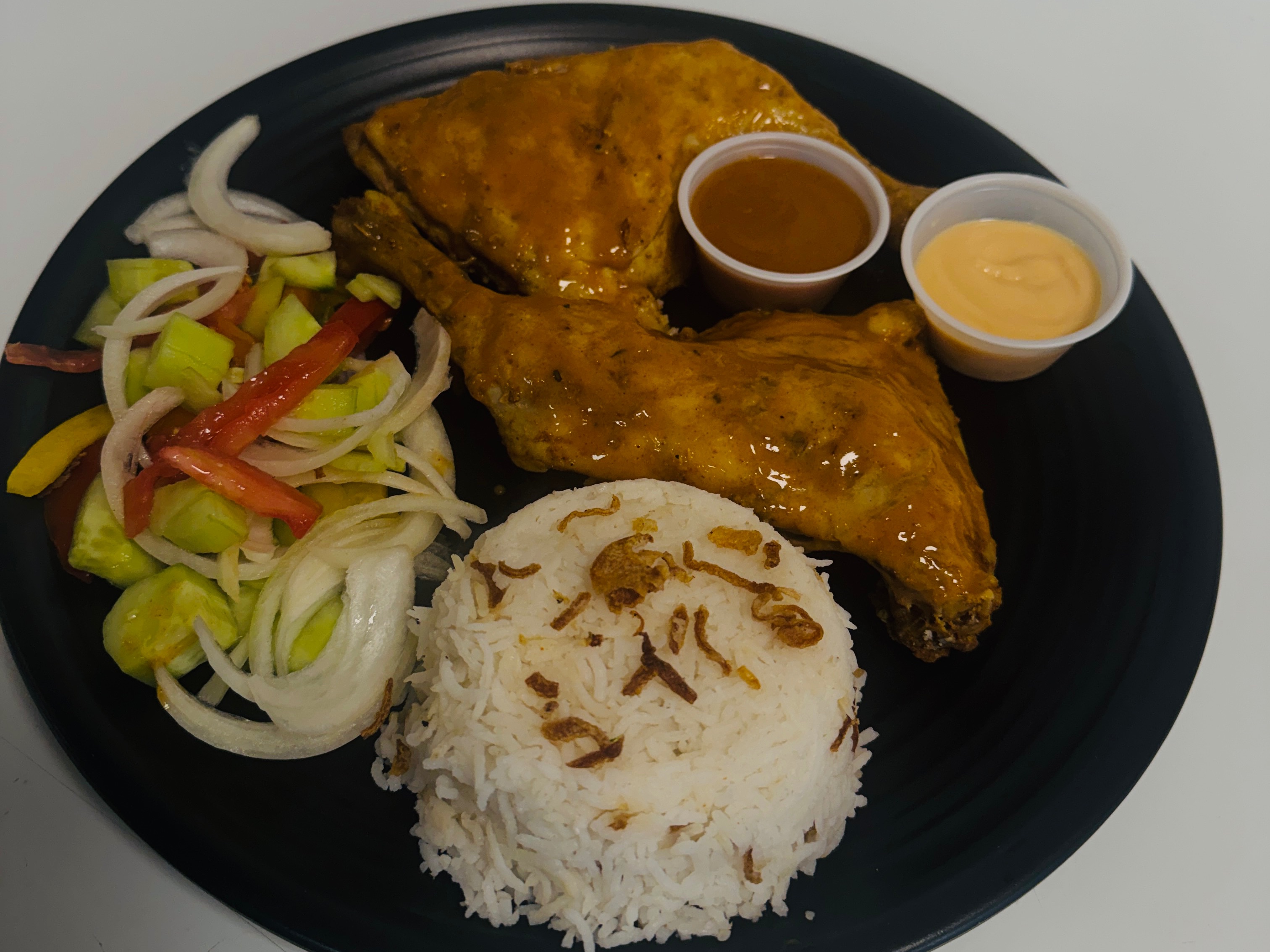 Two 1/4 Leg & Thigh (With Fries Or Rice & Sauteed Onion, Tomato, Pepper) & Choice Of Sauce (Lemon...