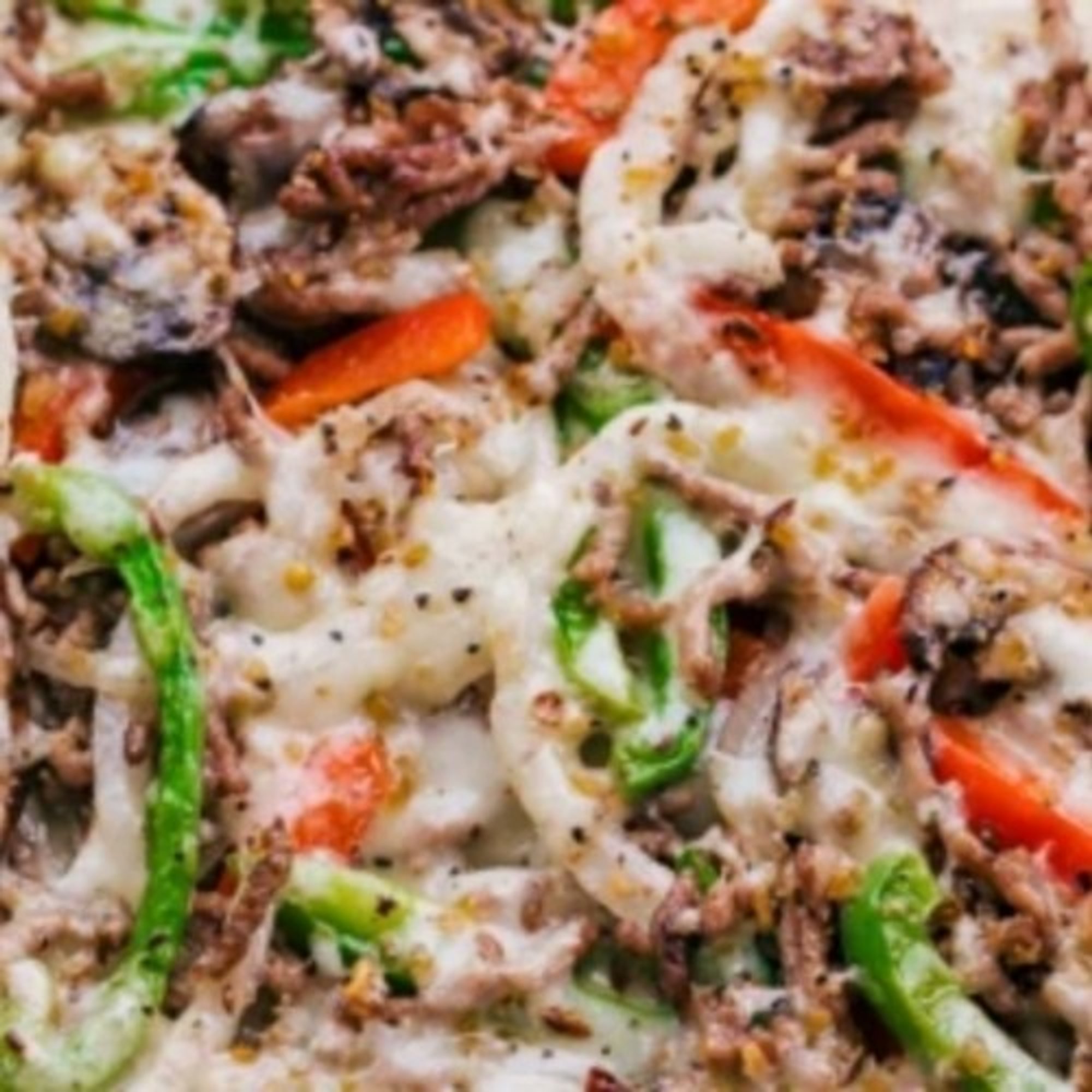 Steak and Chicken Supreme Pizza
