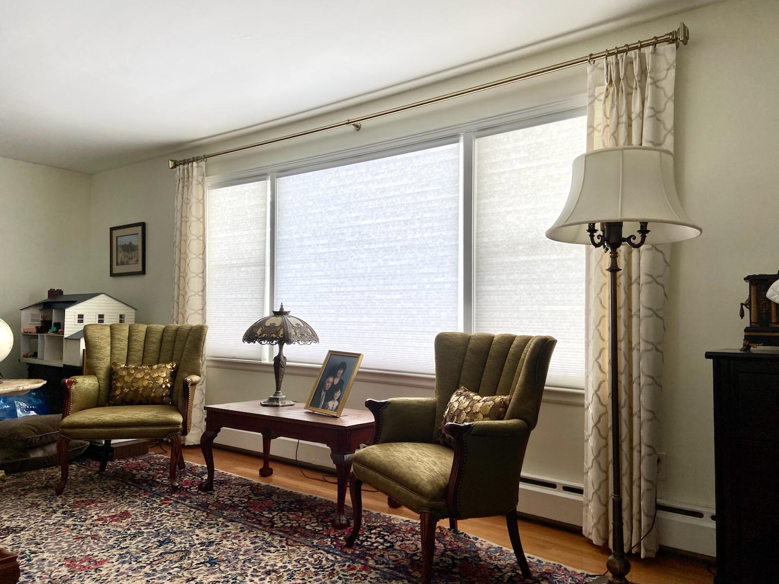 Here's a before-and-after you can't miss! In this Worcester home, we elevated the windows with Custom Drapes plus Cellular Shades. The colors and patterns work amazingly well in this room!  BudgetBlindsWorcesterHolden  FreeConsultation  WindowWednesday  Drapes  CellularShades  WorcesterMA