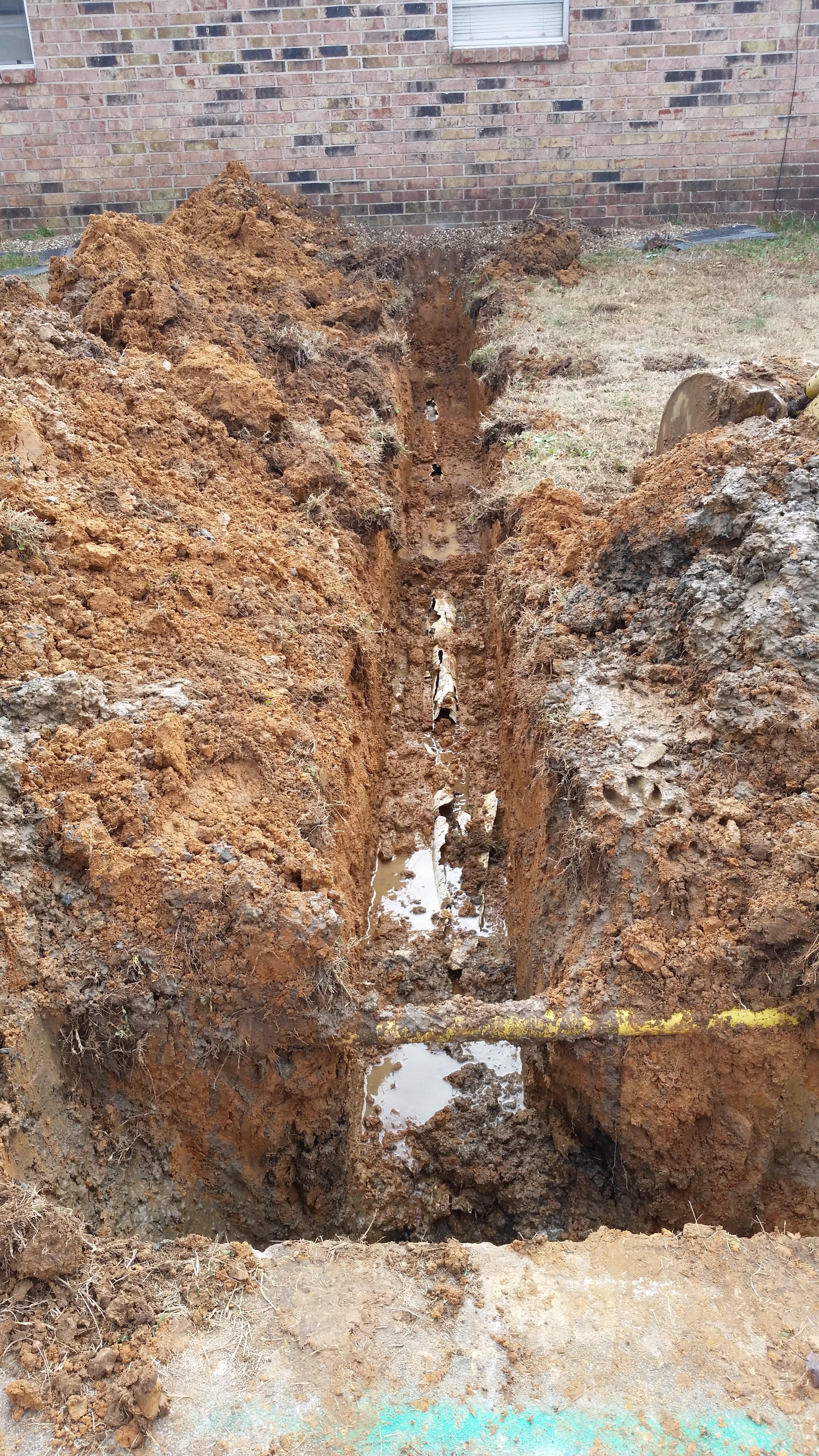 Broken thin-wall sewer pipe in Fort Smith, Arkansas.  Line was unstopped and break located by complementary video scan. Fixed and better than before same day!