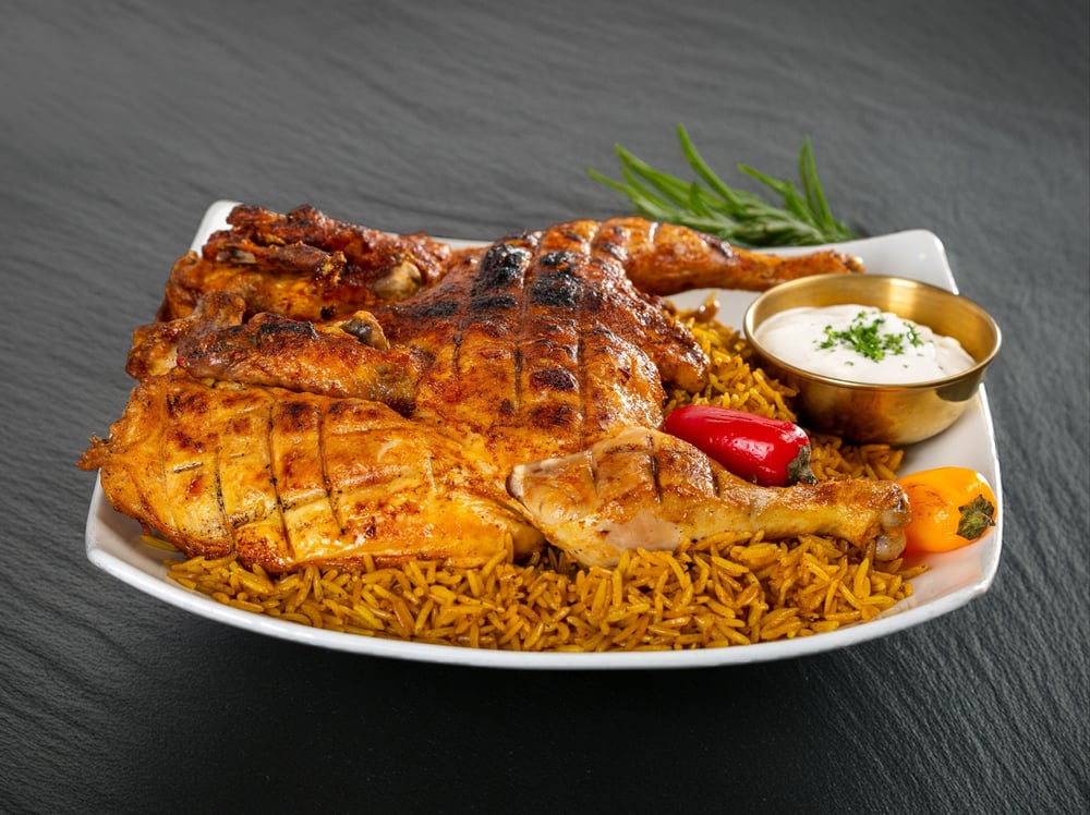 Whole Chicken with Rice / دجاجة كاملة تقدم مع الرز