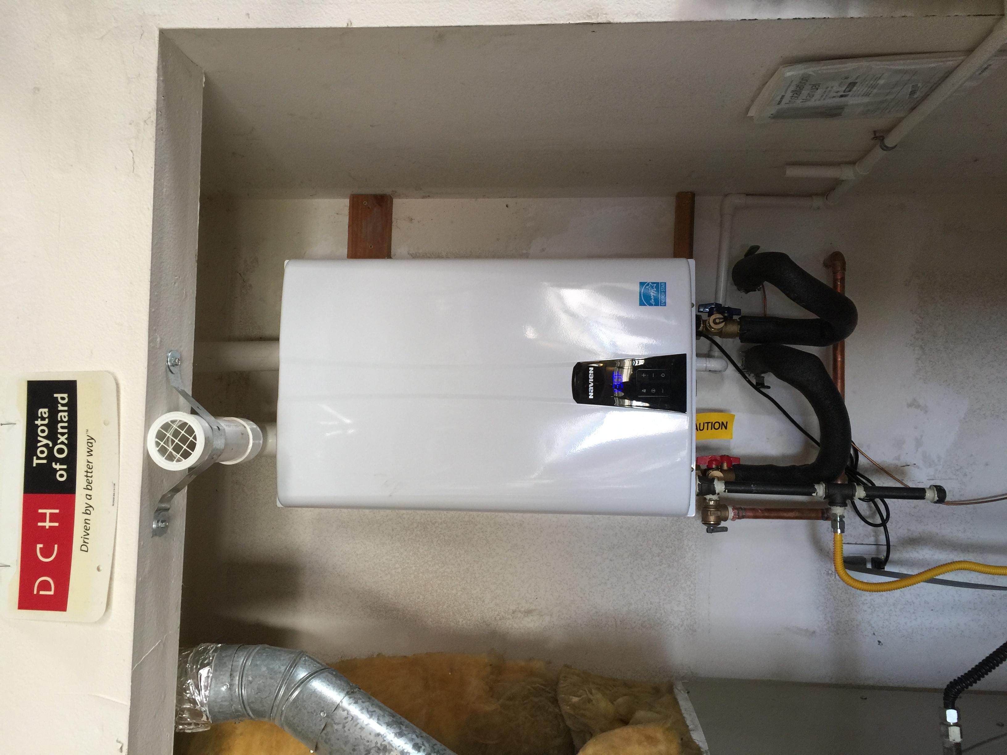 Replace 40 gallon water heater with a tankless water heater in the garage