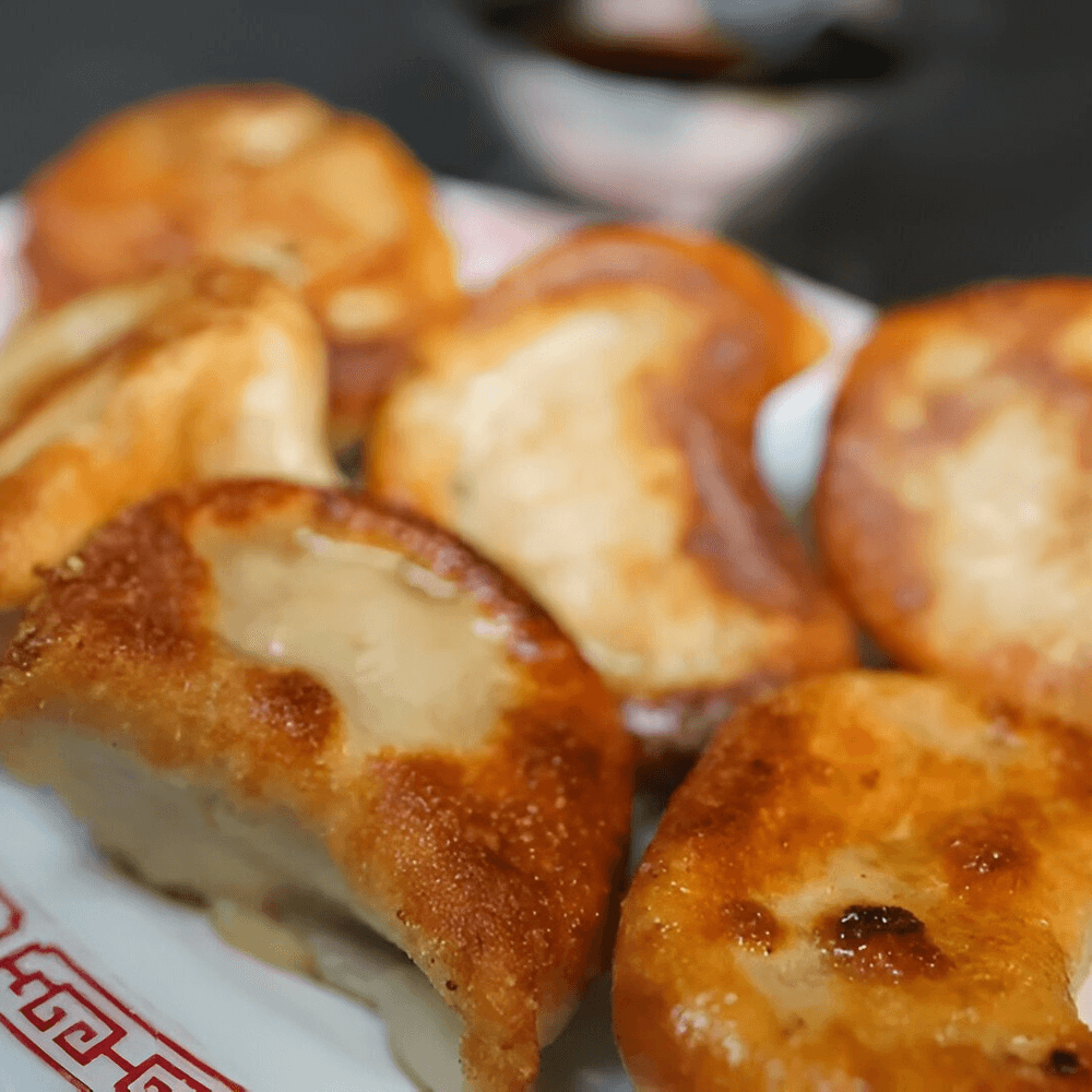 Pan Fried or Steamed Dumplings (6 Pieces)