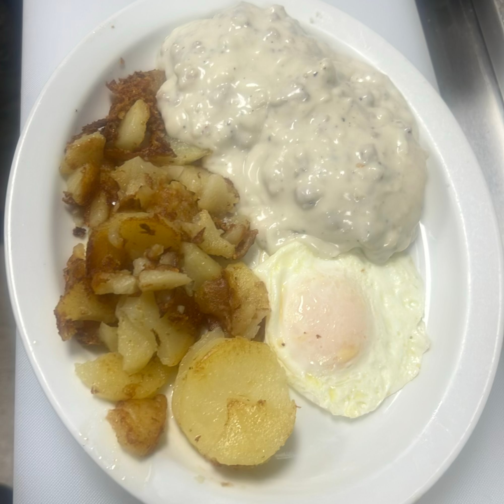 Sausage & Gravy Over Biscuit