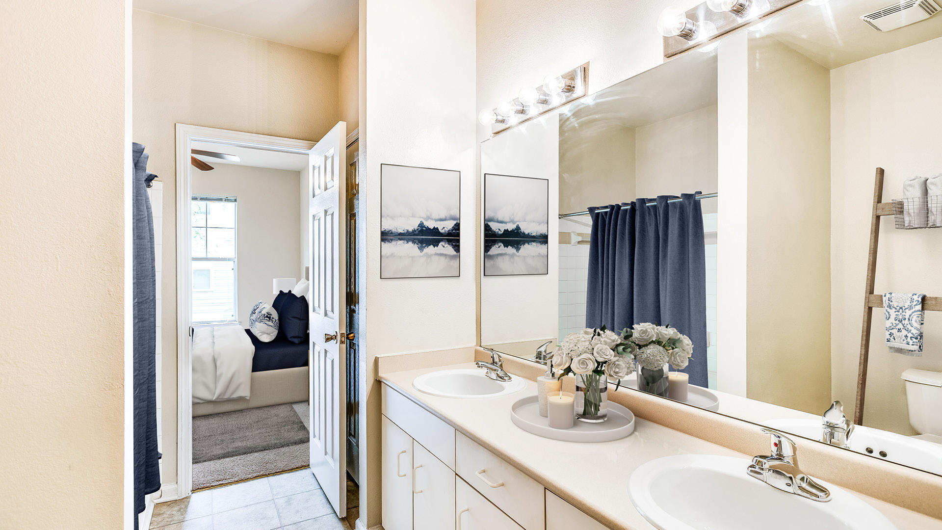 Bathroom with double sink vanity and laminate countertops at Camden Governors Village Apartments in Chapel Hill, NC