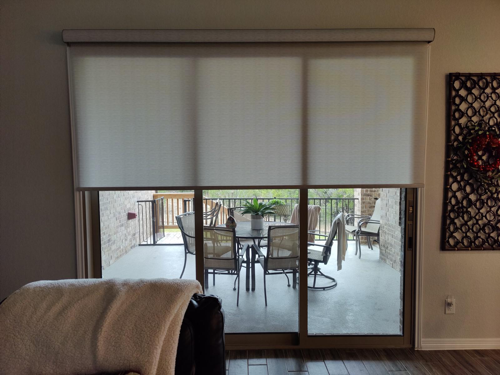 Light filtering roller shade for slider in Lago Vista