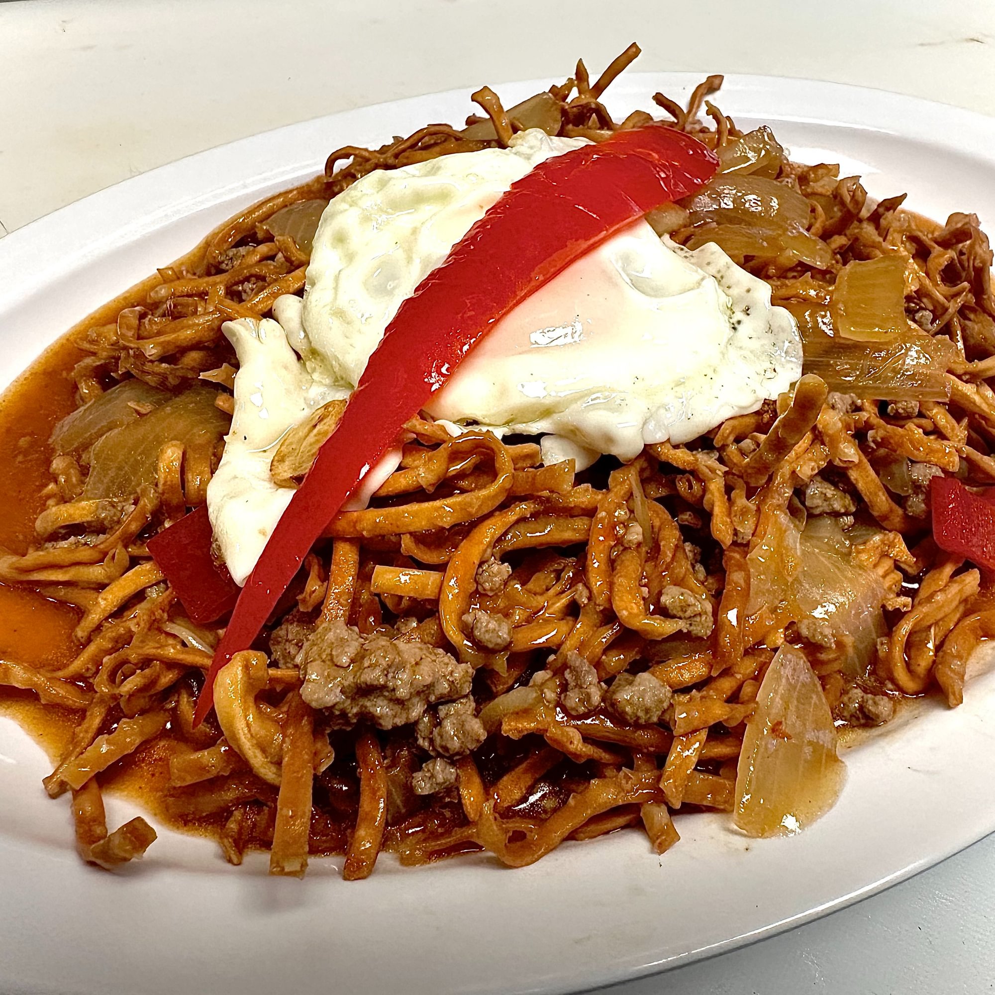 Portuguese steak chow mein plate