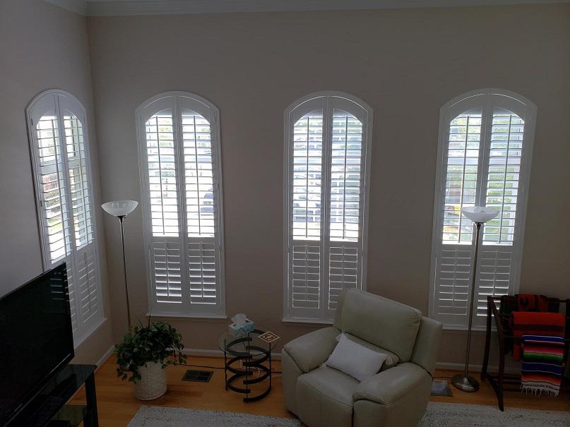 Arched Interior Shutters by Budget Blinds of Arlington & Alexandria can outfit all shapes and sizes of living room windows. Their ability to fit arched windows makes them the number 1 choice among customers!  WindowWednesday  ArchedShutters  BudgetBlindsArlingtonAlexandria  FreeConsultation