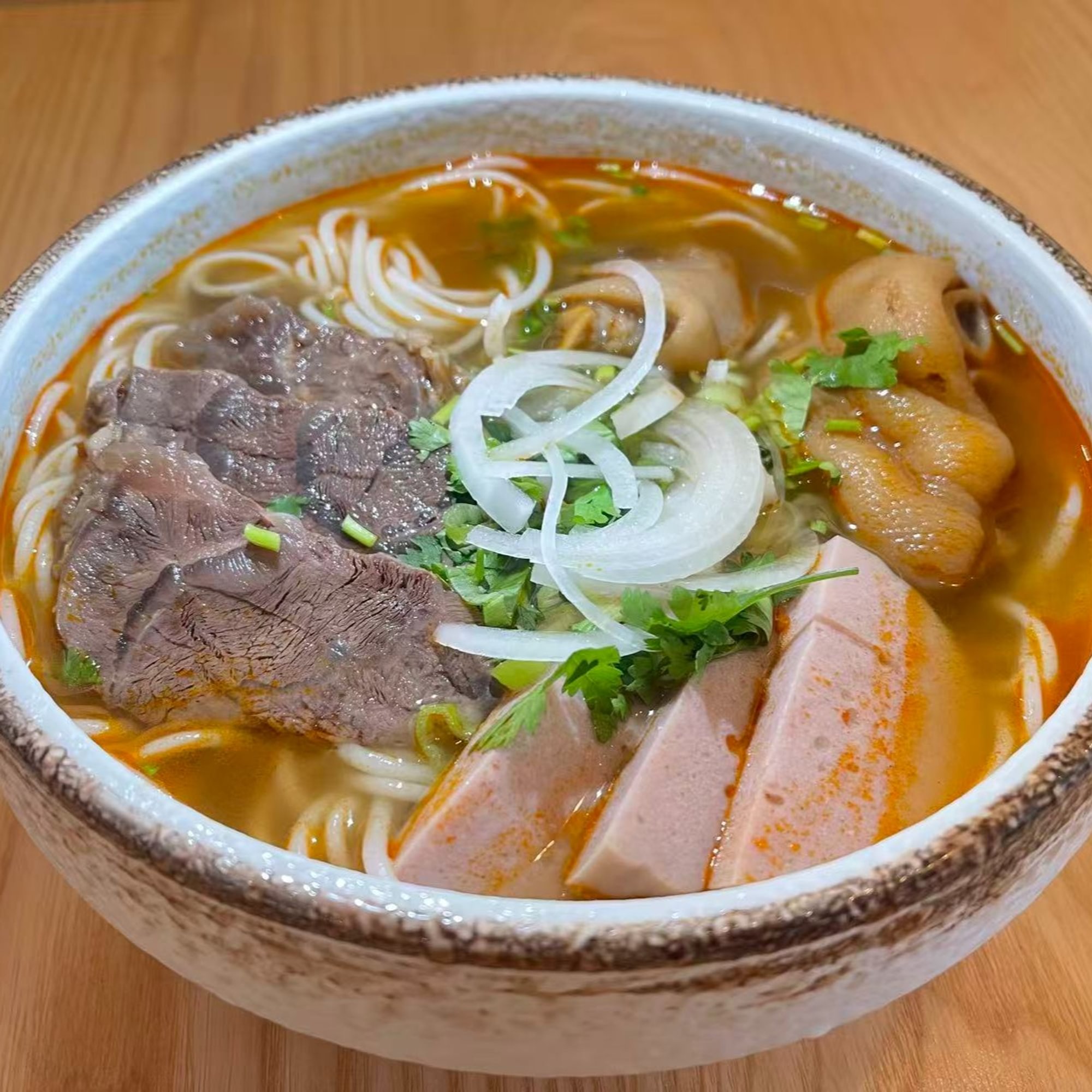 P14. Hue-style spicy beef noodle soup