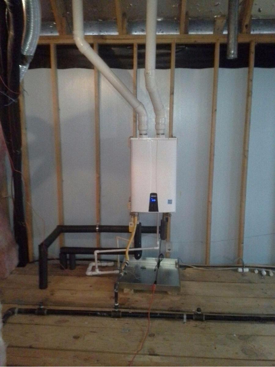 Navien tankless install- the extension cord is temporary until the homeowner has dedicated line run