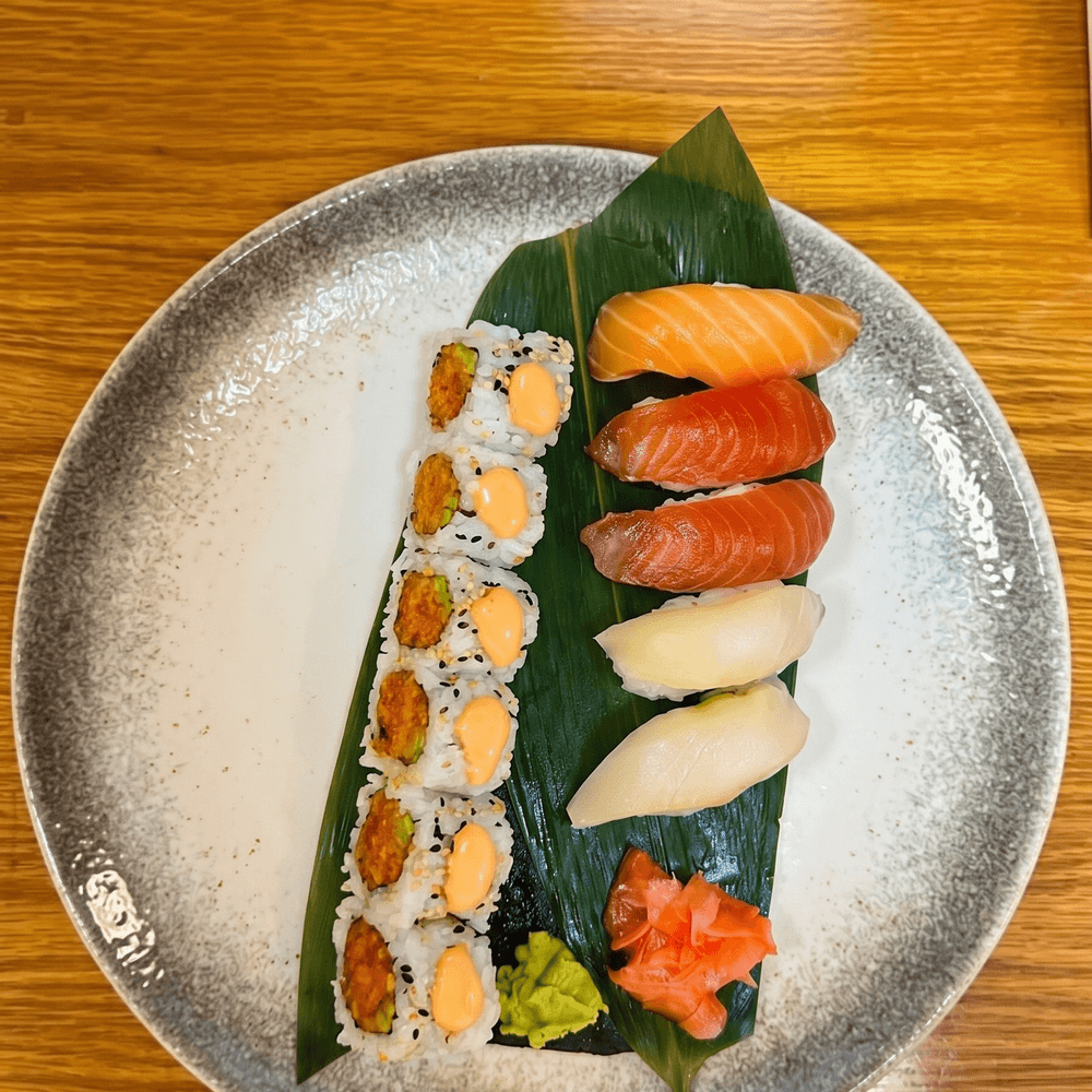 Nigiri Sushi and 1 Spicy Yellowtail or Spicy Tuna Roll