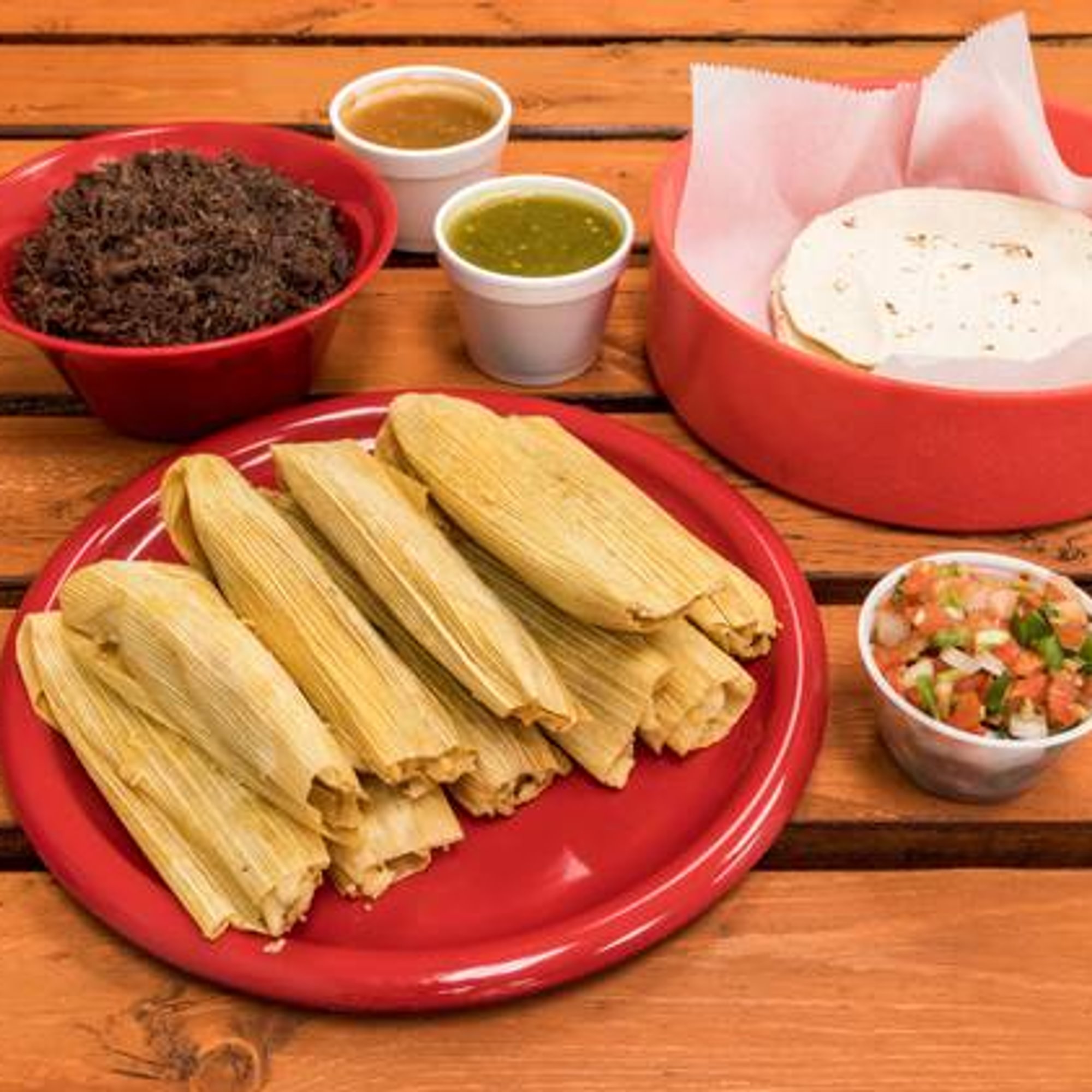 1 Lb Barbacoa, 10 Corn Tortillas, 1 Salsa (4 Oz), Handmade Tamales (1 Dozen)
