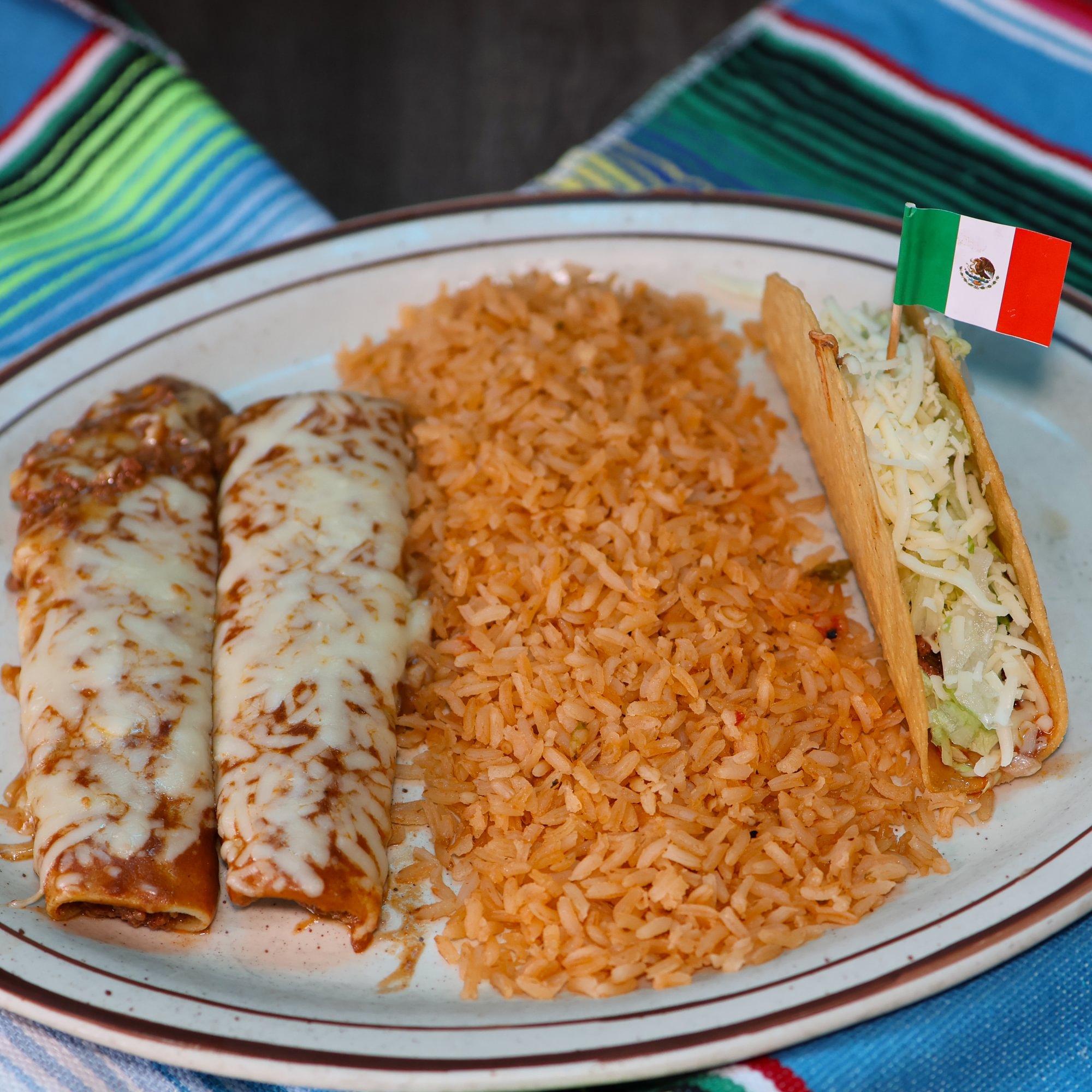 1. Taco, Two Enchiladas with Rice or Beans