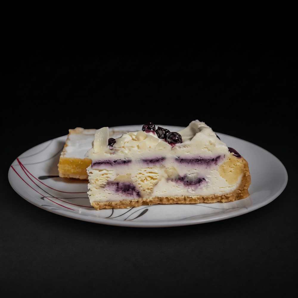 Blueberry Cobbler White Chocolate Cheesecake Slice