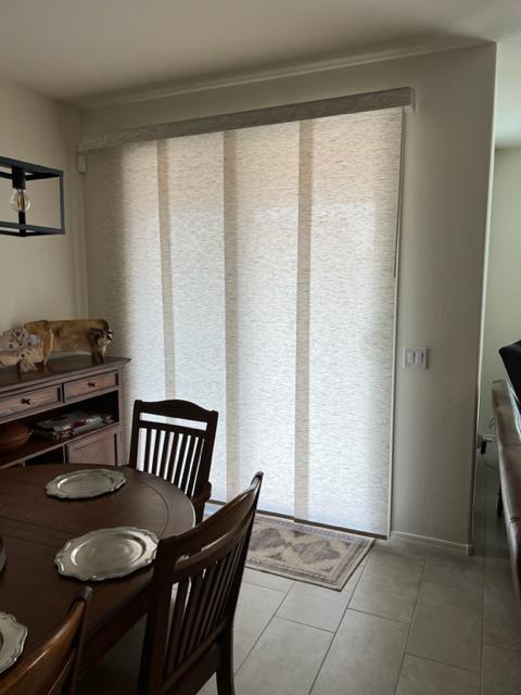 Recently installed Panel Track over a Dining Room Slider in Sahuarita, Arizona.  This panel track consists of 4 panels with a light filtering fabric.  There are are wide range of colors and textures available, including blackout material.