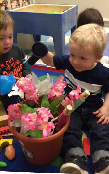 In the Discovery Preschool classroom the children learned how to care for plants and flowers. They used their gross-motor skills and fine-motor skills to plant the seeds in the dirt, and water them.Then they used their imagination to 