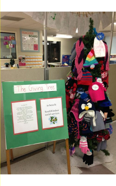 Our Giving Tree, our mittens and hats that we are donating.