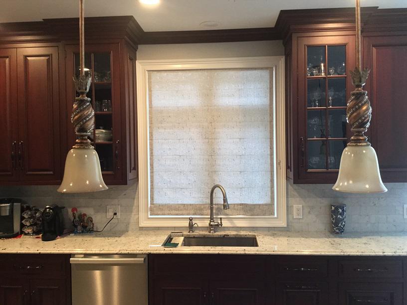 Always get the best light in your Phillipsburg kitchen. This Roman Shade by Budget Blinds of Phillipsburg complements this kitchen's rich elegance. Whether up or down, Roman Shades always look stunning.  BudgetBlindsPhillipsburg  RomanShades  ShadesOfBeauty  FreeConsultation  WindowWednesday