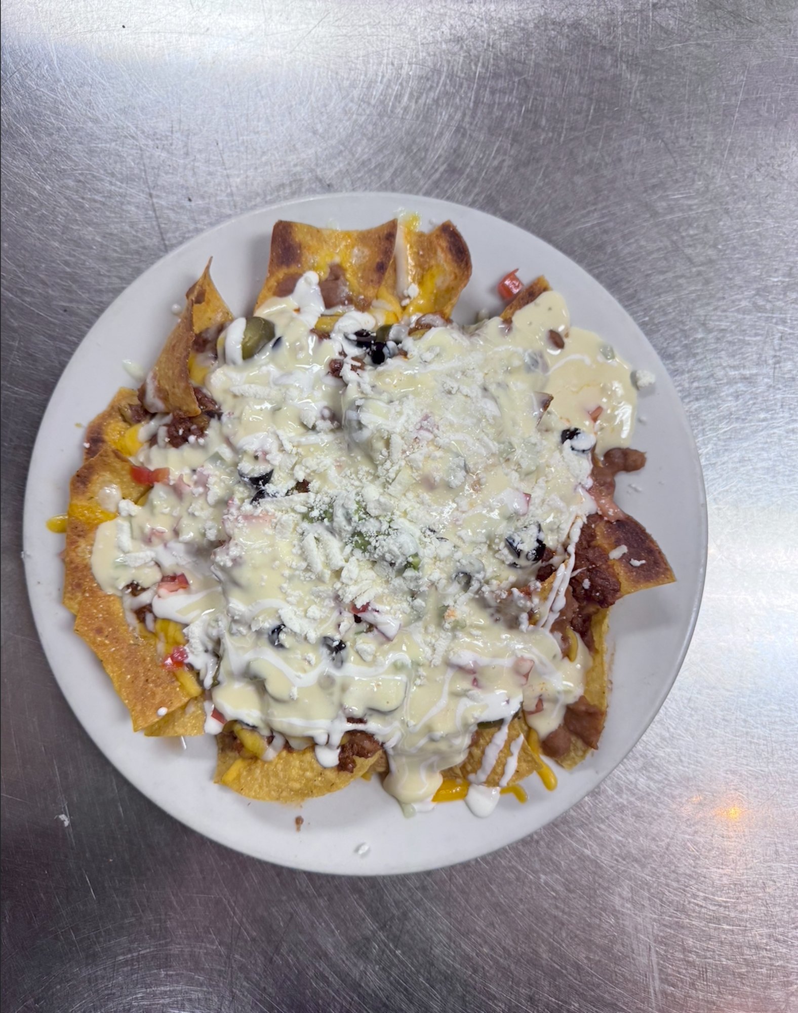 Jalapeno Cheese Dipped Nachos.