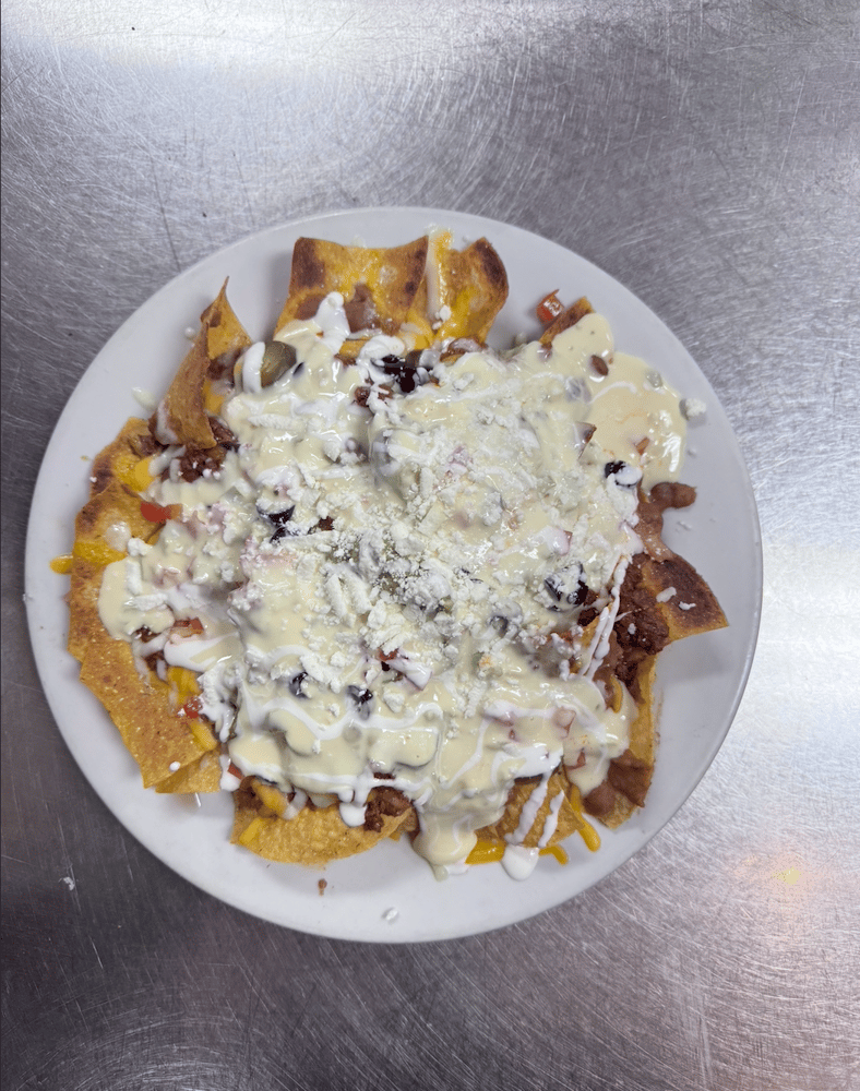 Jalapeno Cheese Dipped Nachos.