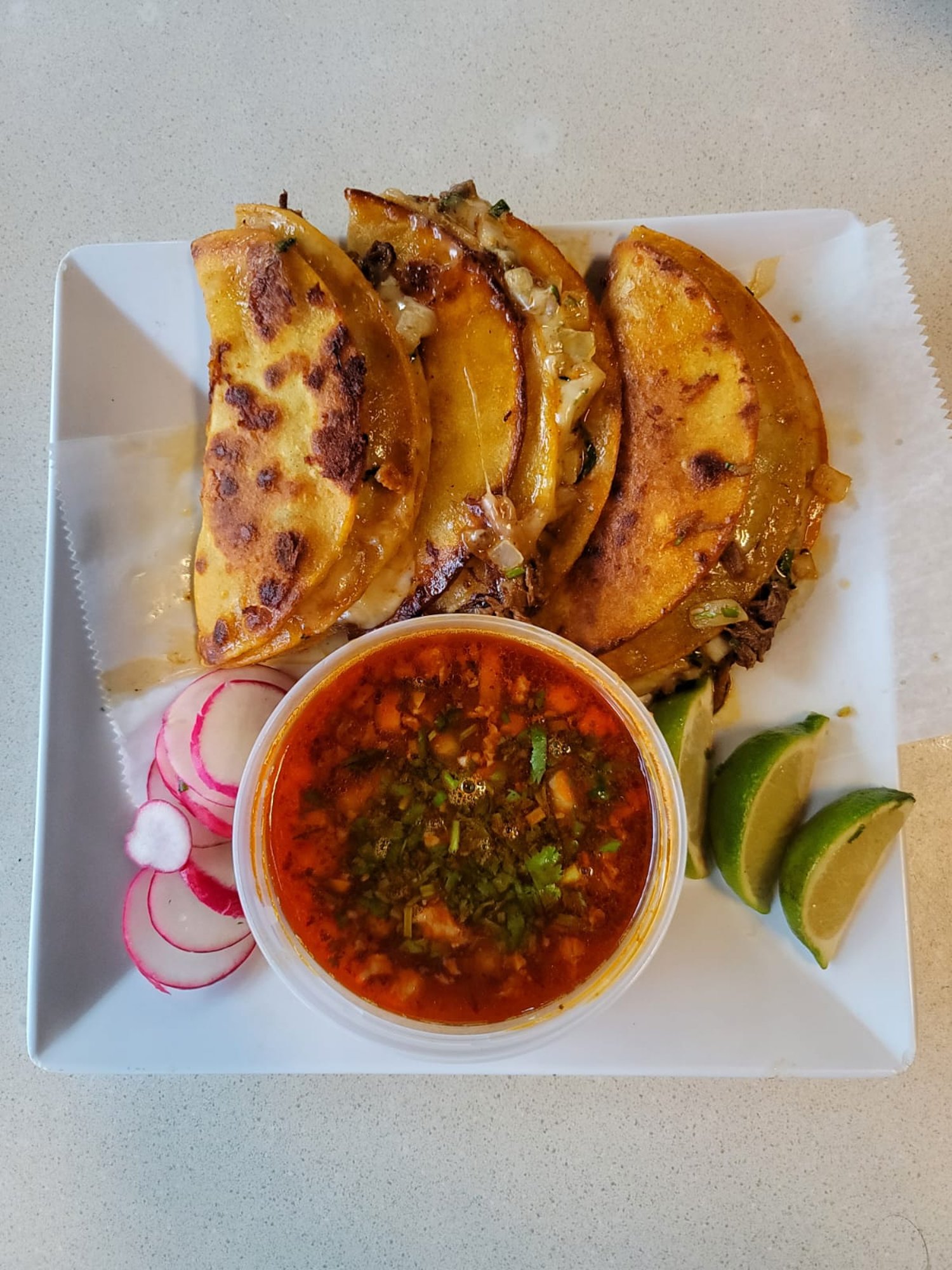 3 Birria and Cheese Tacos with Consomé