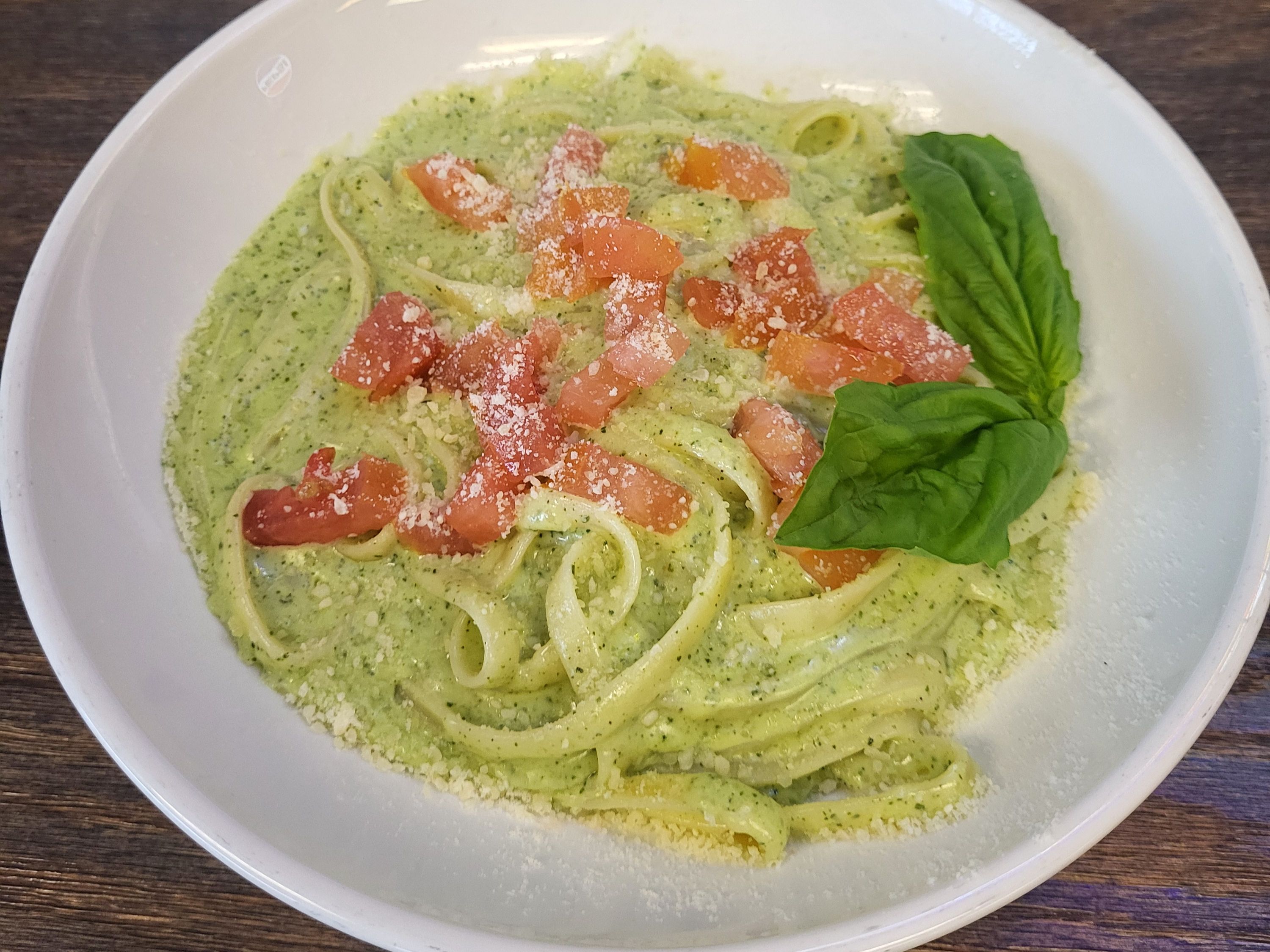 Creamy Pesto Alfredo Topped With Diced Tomato