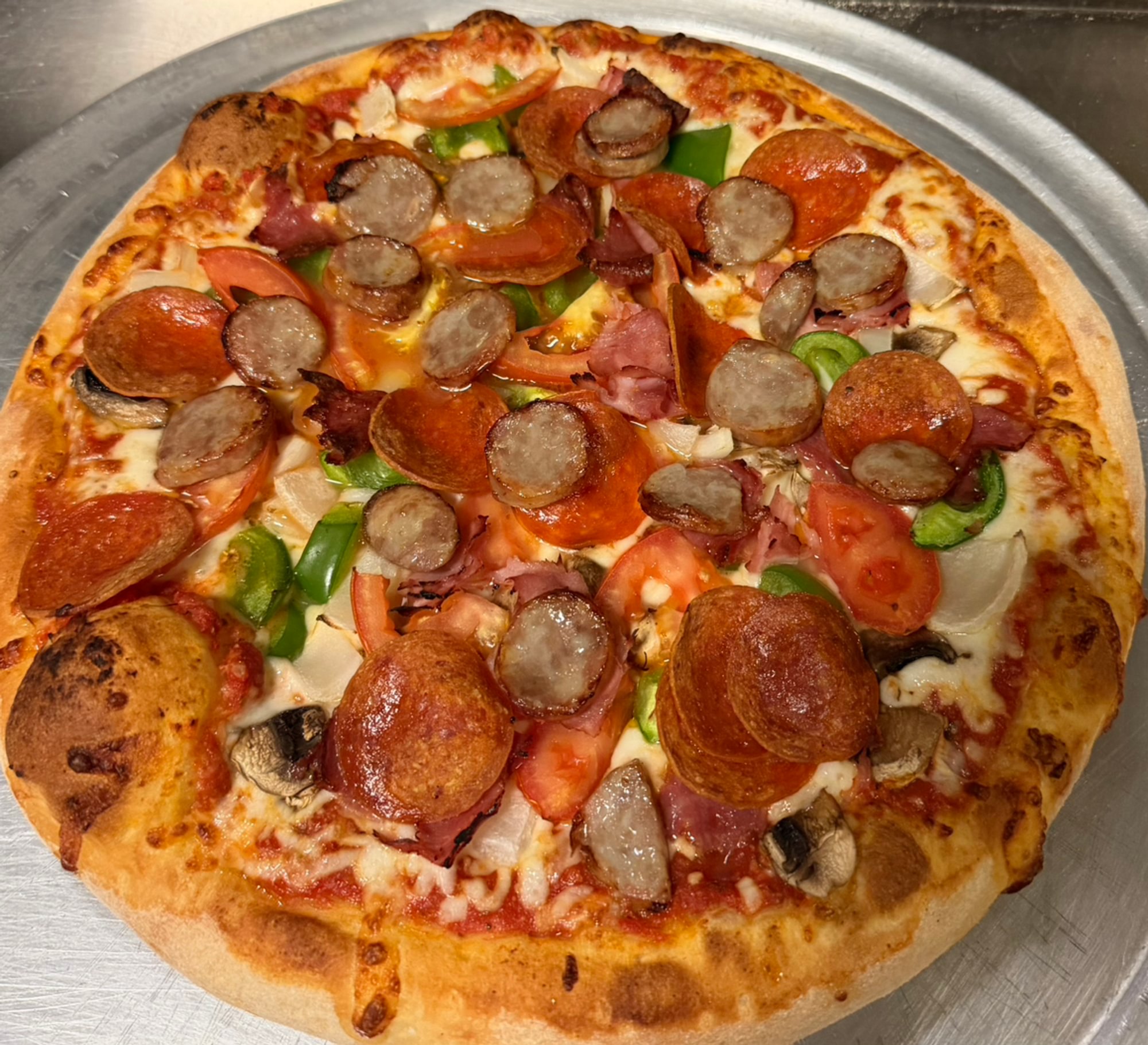 The Deluxe Pizza