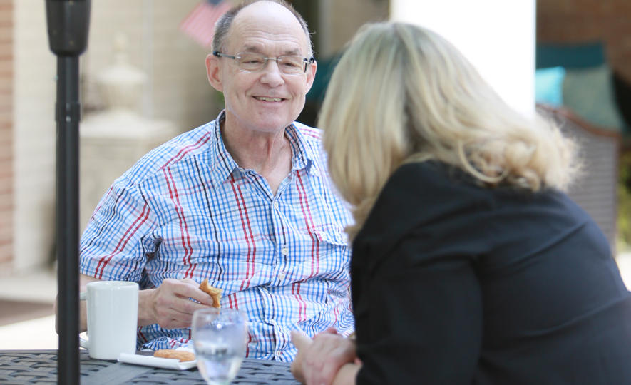 A happy resident at the Silverado Hermann Park Memory Care Community