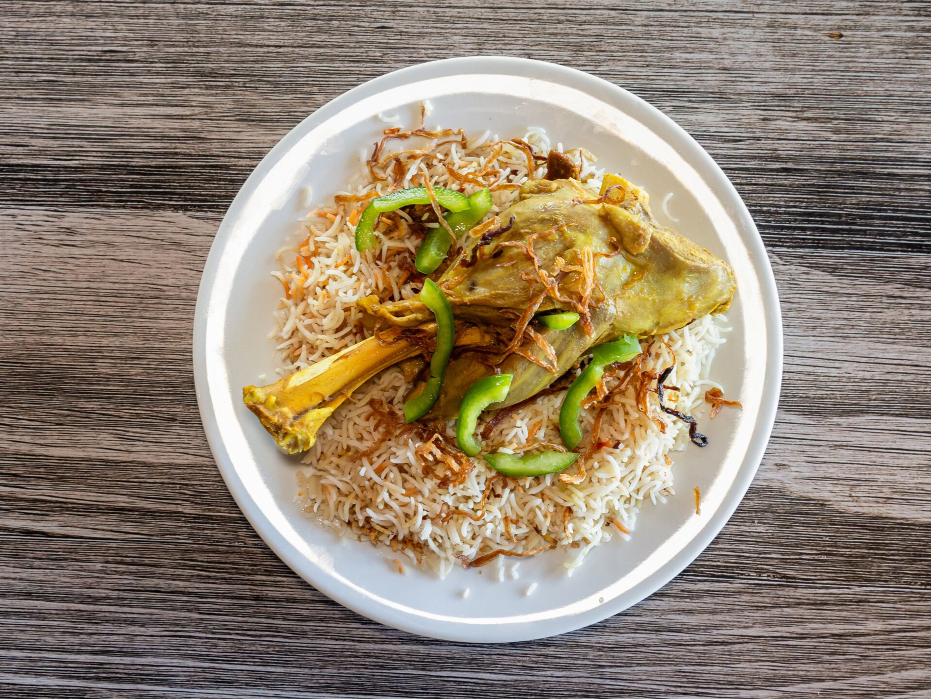 Mathloothah /Lamb Shank مثلوثه لحم موزة مندي